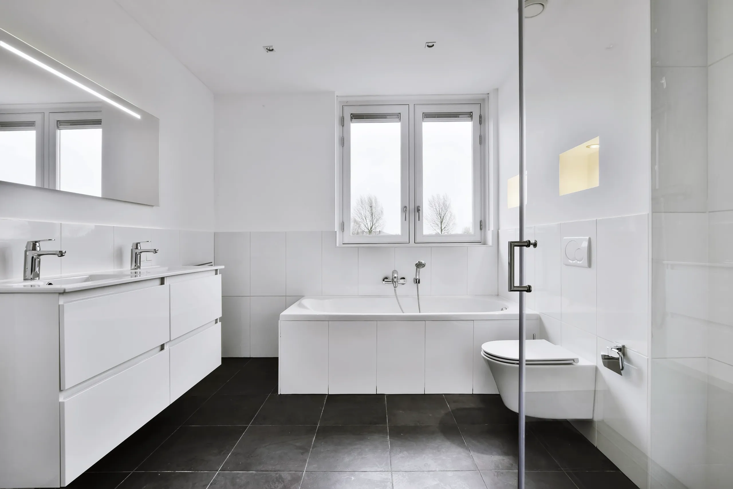Modern bathroom refurbishment with sleek fixtures and clean design